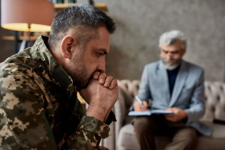 a therapist offers support for ptsd with a military member